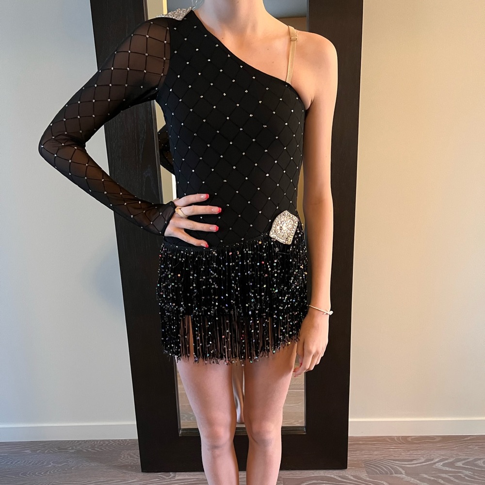 Black one shouldered fringe and rhinestone dance costume by Revolution in SA.